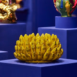 Vaso giallo in ceramica Werns con banane in ceramica