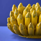 Vaso giallo in ceramica Werns con banane in ceramica