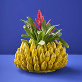 Vaso giallo in ceramica Werns con banane in ceramica