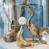 Tavolino Ducky Werns in metallo oro con piano in vetro