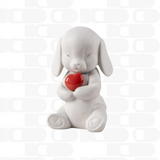 Porcelain sculpture "Buddy – Affectionate puppy" with red heart LLADRÓ